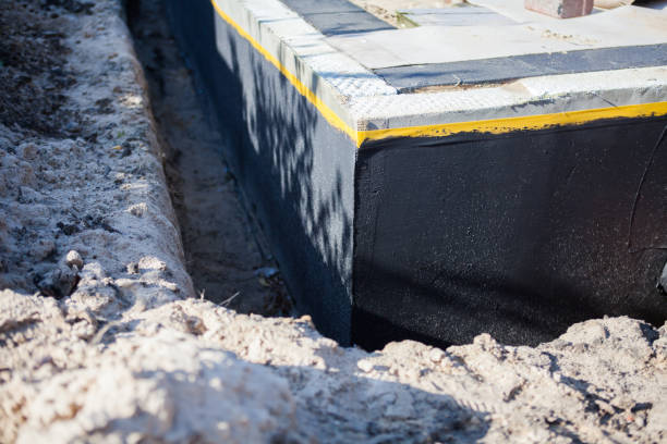 Professional Waterproofing technician working in Gainesville, VA